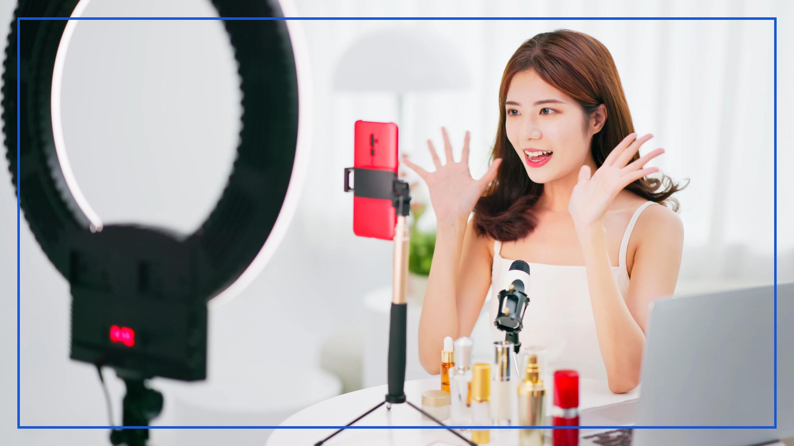 KOL Chinese woman sits in front of camera and reviews products